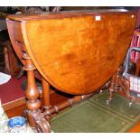 Victorian walnut Sutherland table on turned supports