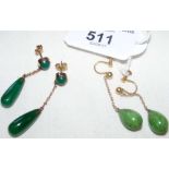 Pair of jade earrings in gold settings and one other pair