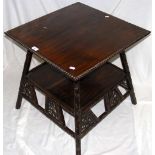 An antique carved Chinese hardwood two tier occasional table - the top 58cm square