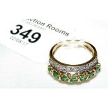 An emerald and diamond ring in 9ct gold setting