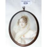 An oval miniature portrait of lady with ringlets, with initial to reverse - 12cm x 9cm