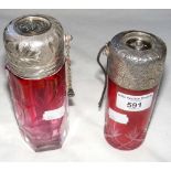 Two large cranberry glass scent bottles with metal mounts