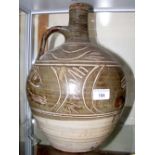 MICHAEL CARDEW - a large earthenware cider jar with slipware decoration, having impressed marks to