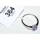 Tanzanite and diamond ring in 18ct white gold setting