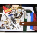 Selection of collectables, including slide rule, napkin rings, etc.