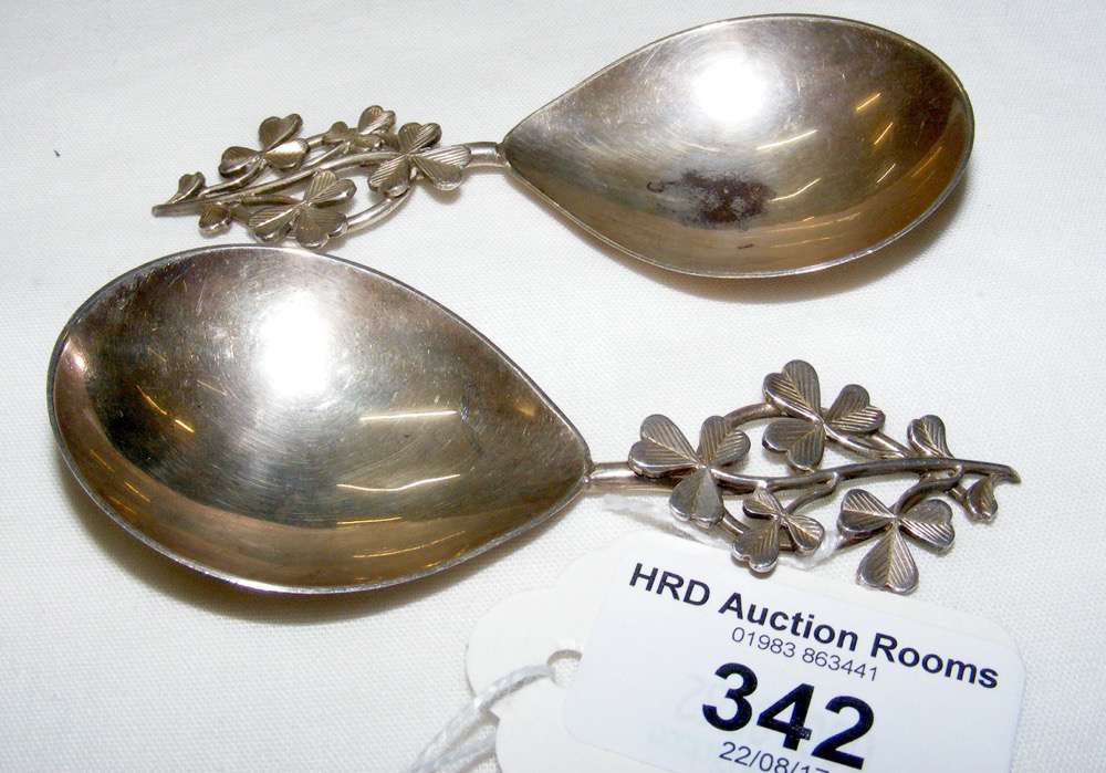 Pair of silver caddy spoons having shamrock handles