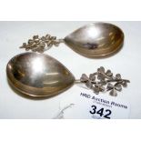 Pair of silver caddy spoons having shamrock handles