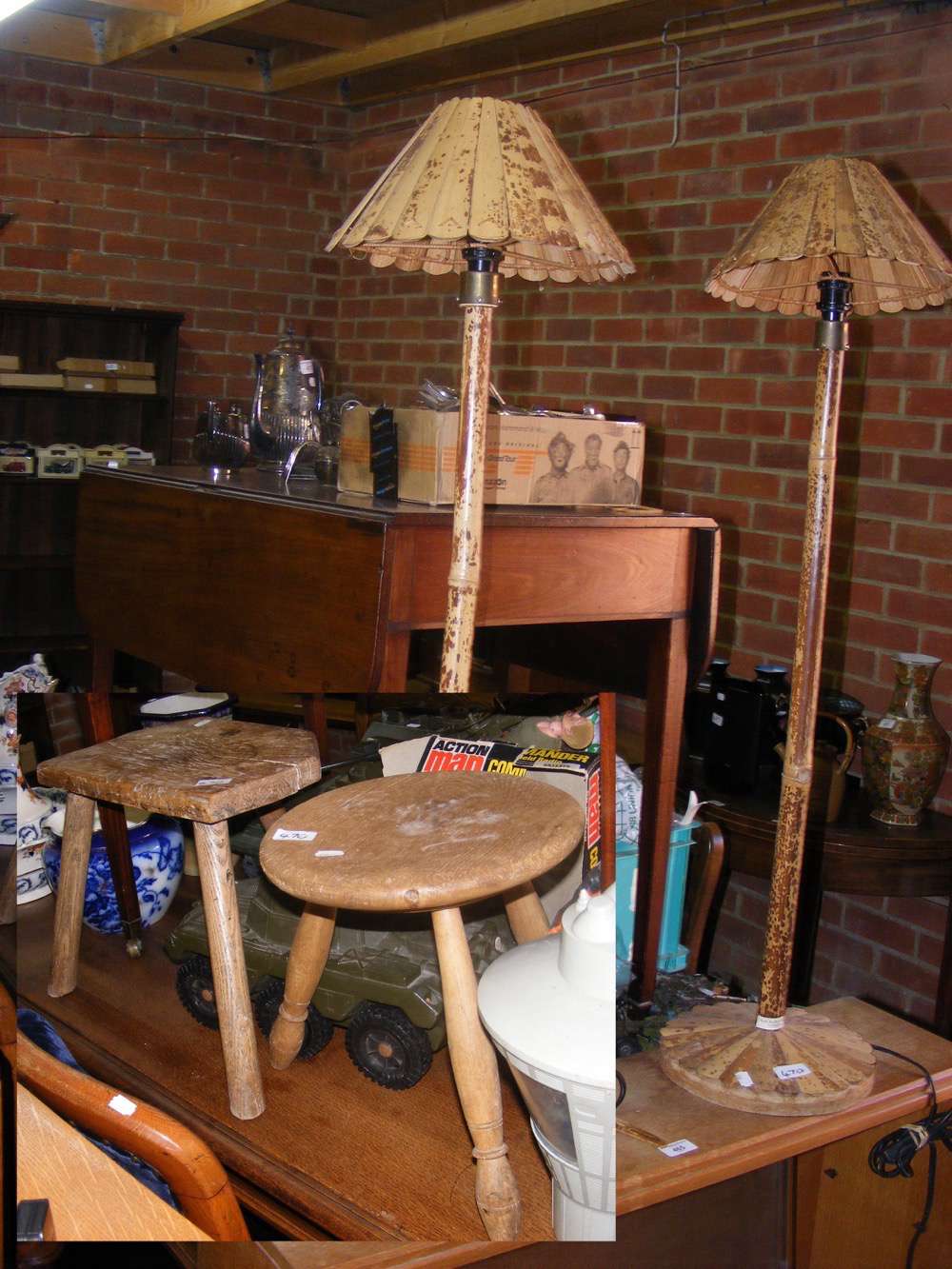 Pair of country stools, together with a pair of bamboo standard lamps