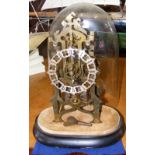 A Victorian skeleton clock - 30cm high