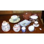 Oriental teapots, cup and saucer