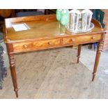 Victorian mahogany two drawer desk on turned supports