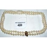 Double strand pearl necklace with 585 marked gold and diamond clasp