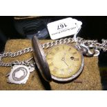 A silver cased full hunter gent's pocket watch with gilt dial, complete with fob and albert