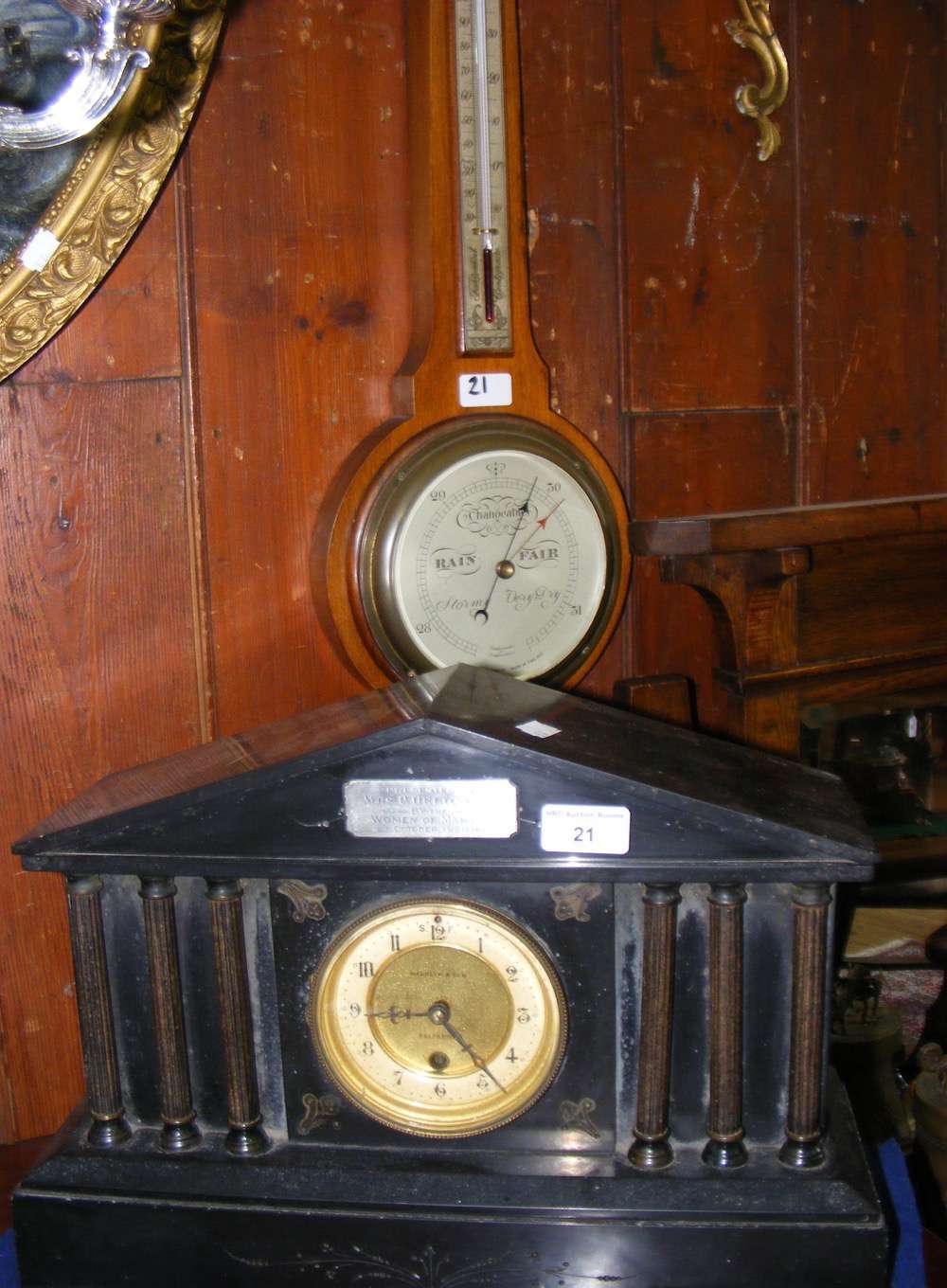 Slate cased mantel clock by Macklin & Sons, Salisbury and an aneroid wall barometer/thermometer