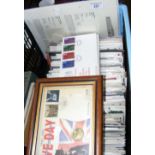 A large collection of First Day Covers, commemorative coins, etc.