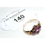 A 9ct yellow gold Edwardian style ruby and seed pearl cluster ring