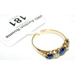 An 18ct gold sapphire and diamond five stone ring