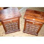 Pair of eastern hardwood bedside cabinets with brass stud work to the doors