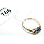 A 9ct yellow gold sapphire cluster ring