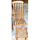 A folding antique garden chair, together with an oak stool