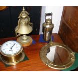 A ship's bulkhead clock, bell, etc.