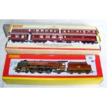 Boxed Hornby Locomotive and Tender, together with The Pines Express Coaches