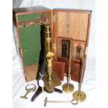 A 19th century brass monocular microscope by Powell & Lealand, London, with original fitted carrying
