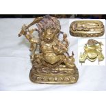 A Sino - Tibetan unusual gilt bronze two part figure - 18th century - top figure removed to reveal