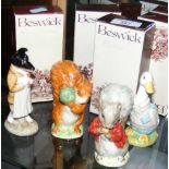 Four boxed Beswick Beatrix Potter figures, including "Squirrel Nutkin"