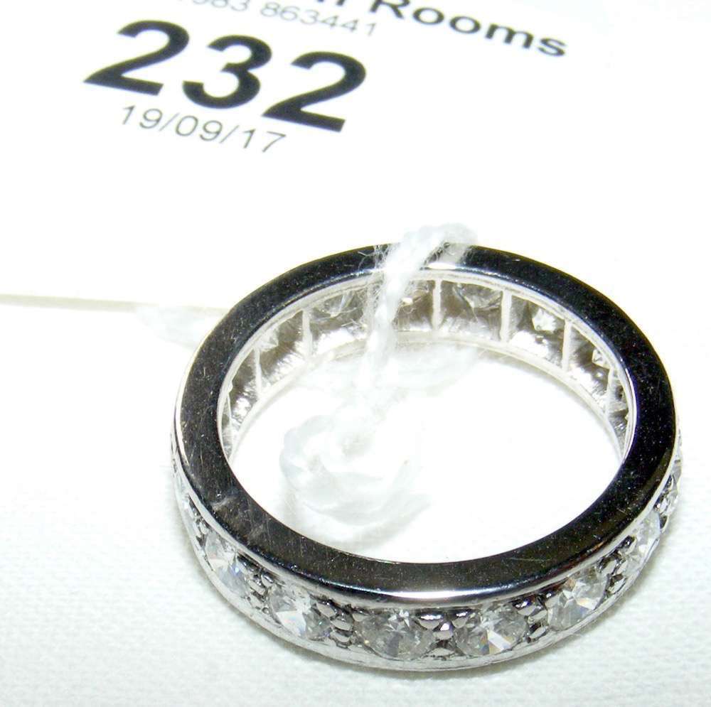 A diamond full eternity ring in white gold setting