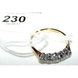 Five stone diamond ring in gold setting