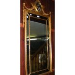 A decorative gilt wall mirror