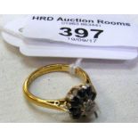 A 9ct yellow gold sapphire and diamond cluster ring