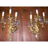 Pair of Rococo ormolu three branch wall lights