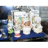 Four boxed Beswick Beatrix Potter figures, including "Mrs Tiggy Winkle"