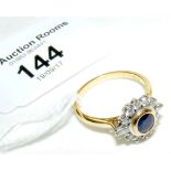 An 18ct yellow gold sapphire and diamond ring