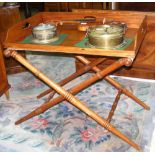 An antique Butler's tray on folding turned stand