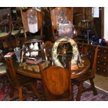 Arts and Crafts style oak dining table and the matching set of six chairs with Lion's rampant to the