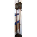 Pair of interesting antique metal and wooden staff lights