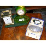 A carriage clock, silver back brush, etc.