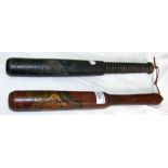 Hand painted antique truncheon, together with one other