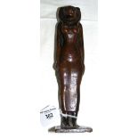 A 24cm bronze Egyptian Lion's head deity figure with hieroglyphs to the rectangular base