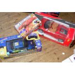 Two large boxed racing cars, etc.
