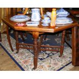 Edwardian mahogany octagonal centre table on carved and turned supports - 110cm