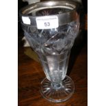 A 26cm cut glass vase with silver mount