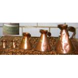 Graduated set of five antique copper measures