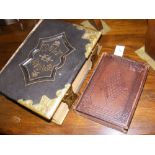 Brass and leather bound family Bible and a leather bound 1675 Bible