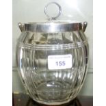 A faceted glass biscuit barrel with 925 marked continental lid, mount and handle