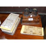 An old Stereo viewer (lacking one lens), together with Stereo viewing cards, including many of the