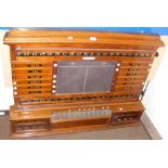 A Thurston & Co. Ltd., London, Victorian mahogany snooker scoreboard with rolling numbers and